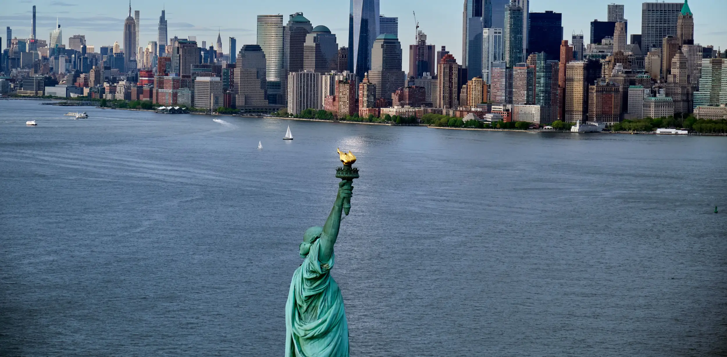 drone-shot-of-statue-of-liberty-and-lower-manhatta-2025-02-06-02-54-05-utc